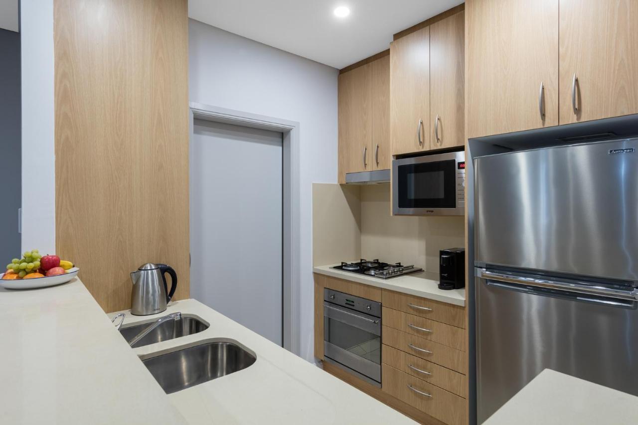Meriton Suites Waterloo Сидней Экстерьер фото A typical kitchen in a student apartment