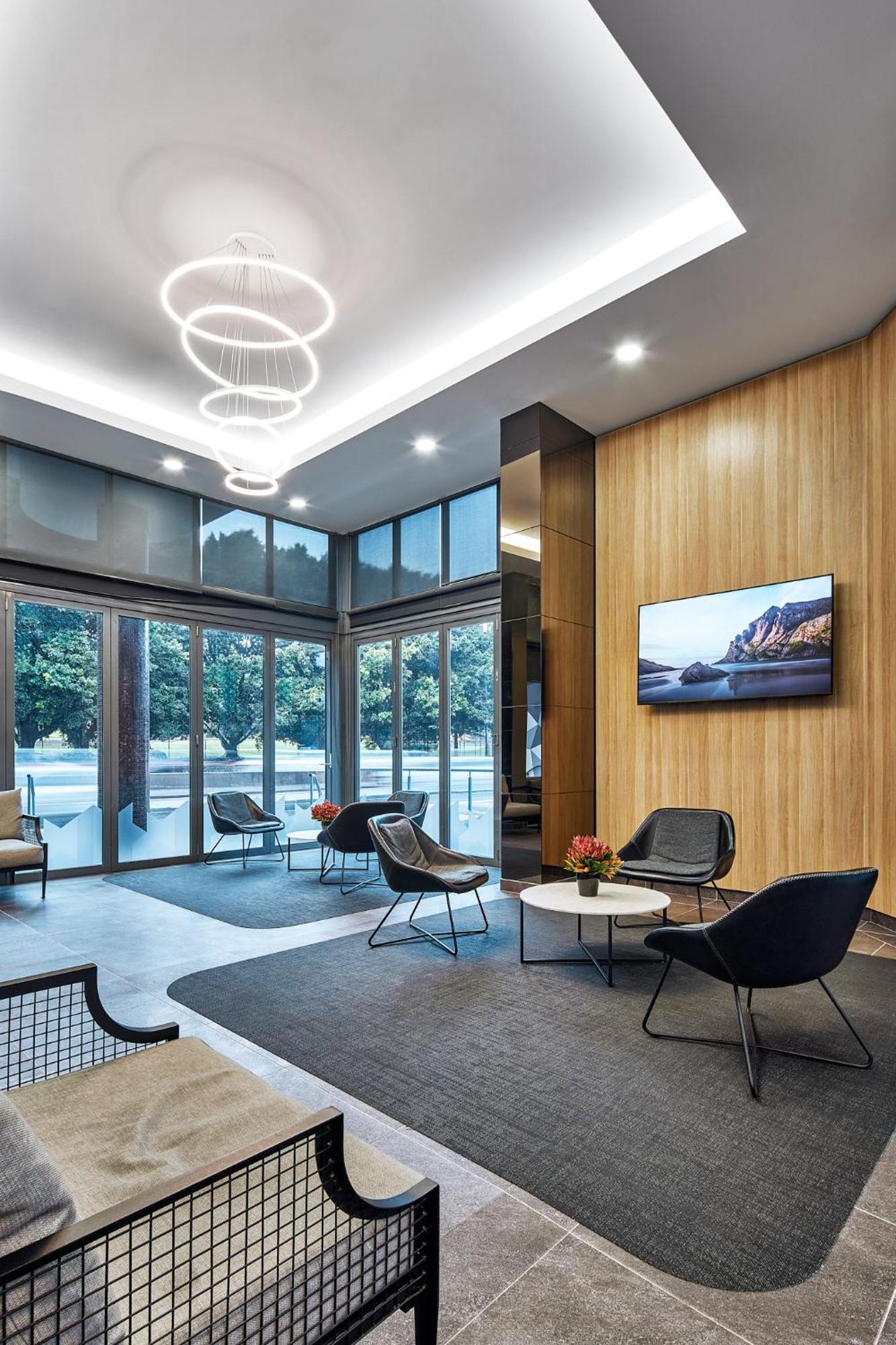 Meriton Suites Waterloo Сидней Экстерьер фото The lobby of the new building
