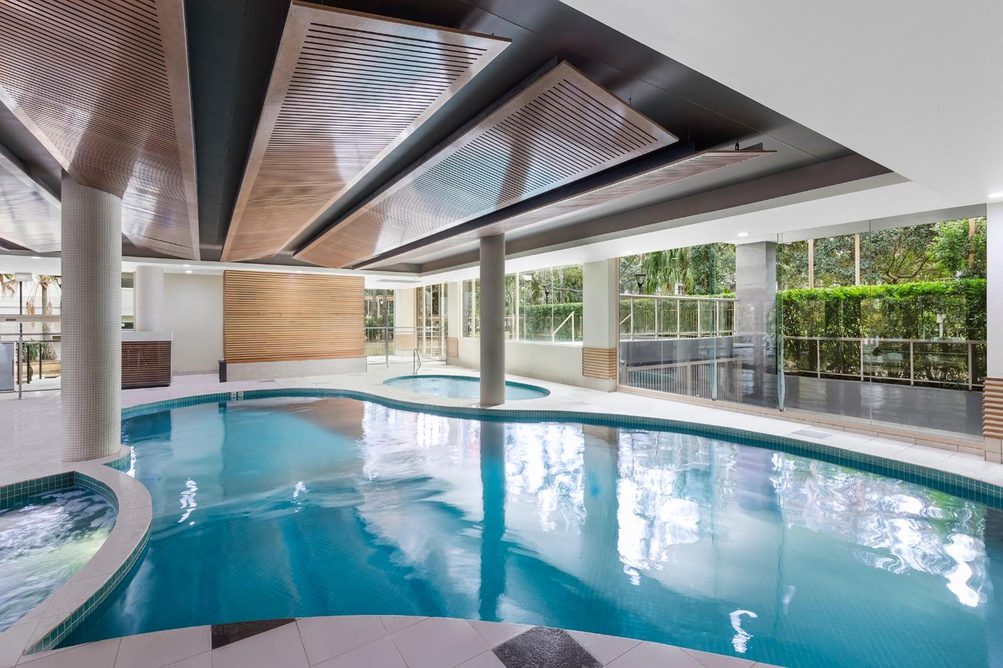 Meriton Suites Waterloo Сидней Экстерьер фото The pool at the 2011 Commonwealth Games Village